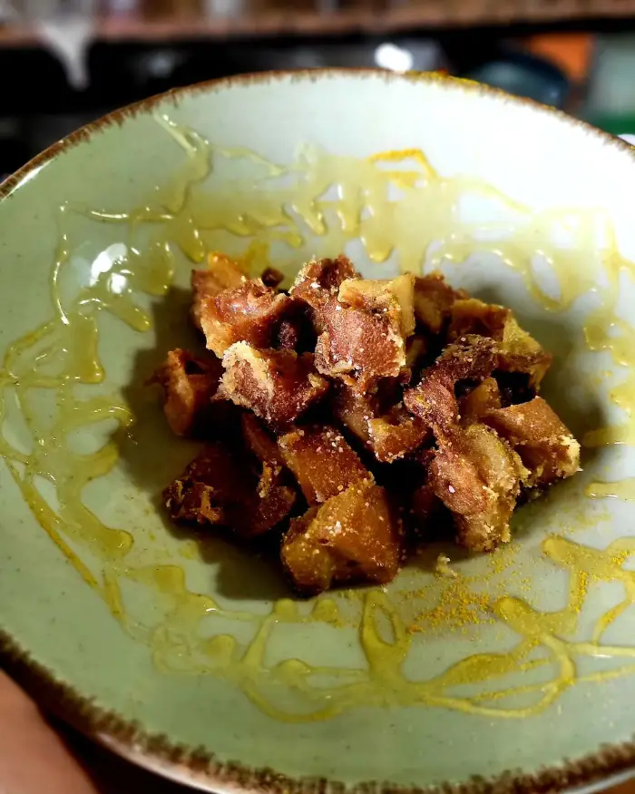 Tapa de morro miel y curry en Restaurante Moratilla
